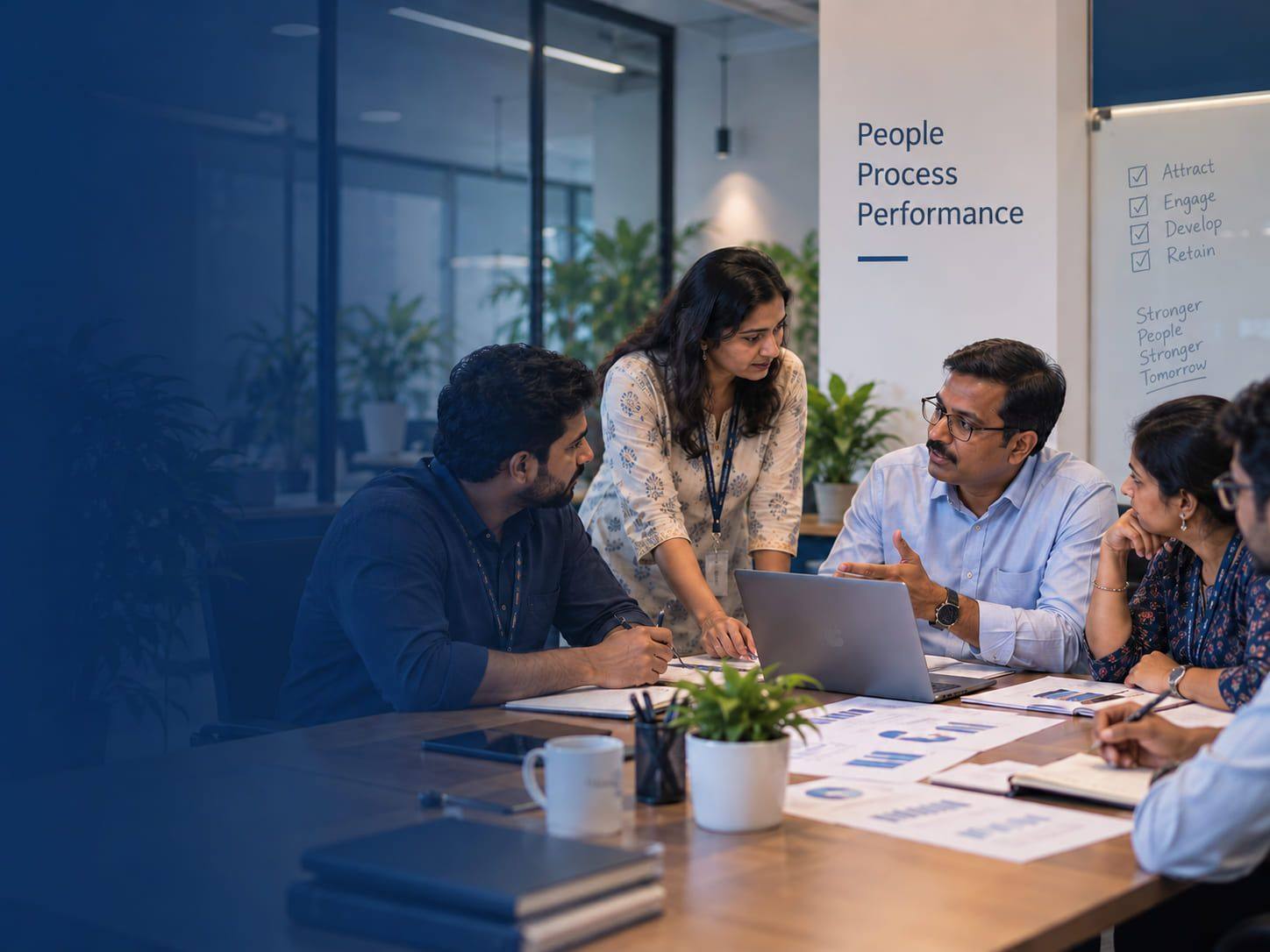Colleagues reviewing documents together in a modern office